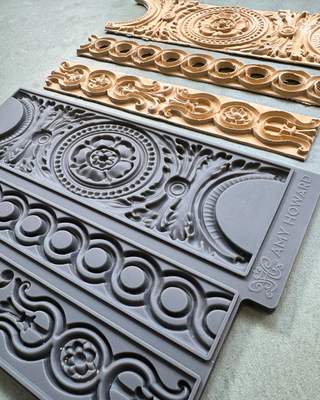 Alexandria Silicone Furniture Mould showcasing an elegant scroll and floral border design for crafting custom cast appliqués, trim, and ornamental borders. Used with Amy Howard at Home WoodCast. 