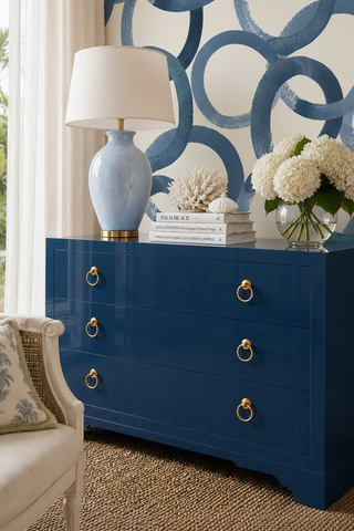 Lacquered Dresser in Coastal Calm LuxeLacquer by Amy Howard Home and the Loop Wallpaper in Indigo.