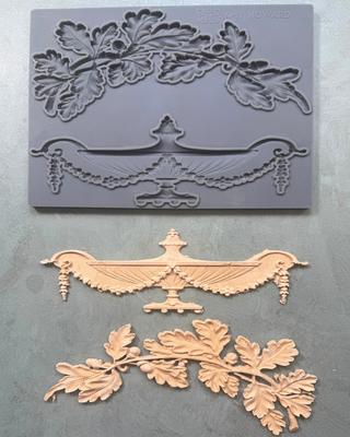 Empire Silicone Mould featuring oak leaves and a classical urn design, used with WoodCast™ to create custom European-style decorative appliqués for furniture and cabinetry.