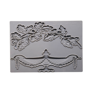 Empire Silicone Mould featuring oak leaves and a classical urn design, used to create custom European-style decorative appliqués for furniture and cabinetry.