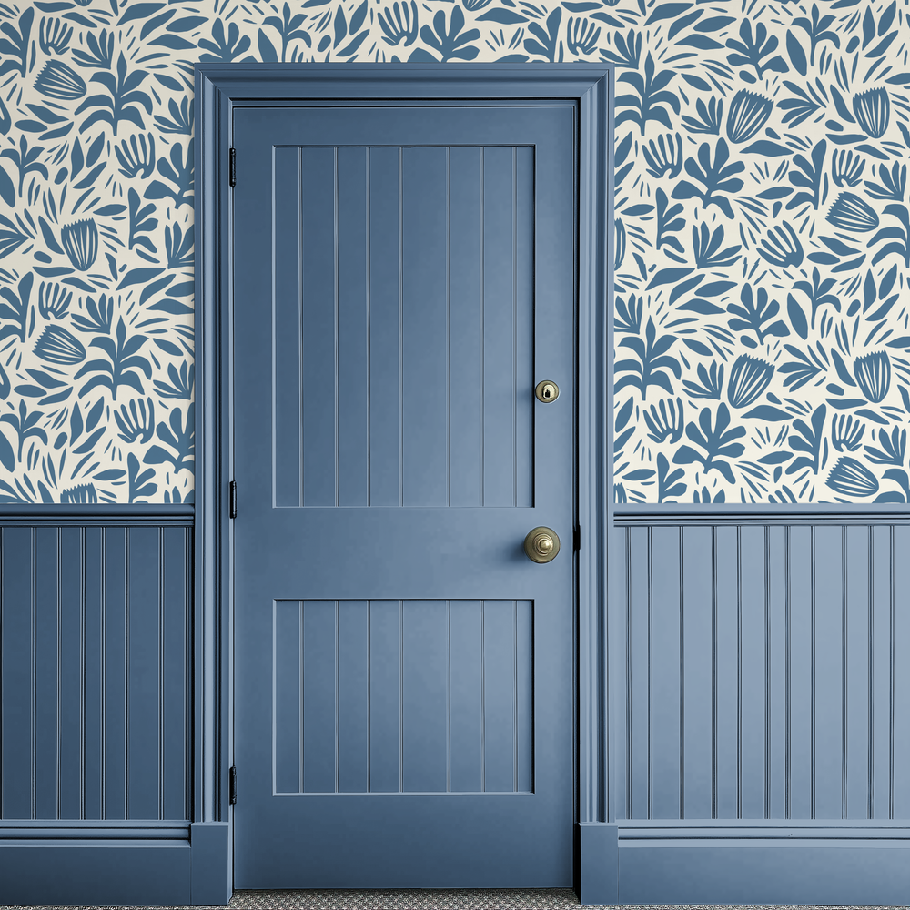 Saint Tropez Wallpaper in the color Indigo and Manor Borne Wall Paint in the color Rise and Shine by Amy Howard at Home