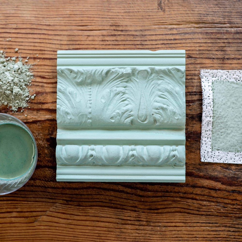 Topiary is a soft, weathered green inspired by the aged patinas of European garden statuary and time-touched architectural details. This gentle, muted hue brings an earthy elegance to furniture and decor—perfect for creating layered antique finishes or adding a serene, historic charm to any piece.