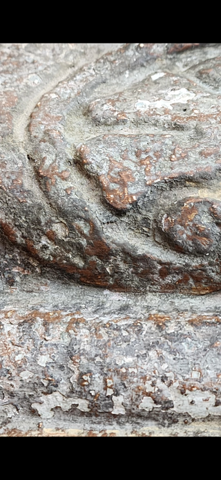 Detailed texture of layered cracked gesso and antiquing glaze on Weathered Chapel Patina finish showing aged stone and oxidized metal effect