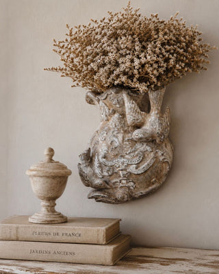 Finished Aged Sterling Patina Finish wall pocket showing layered silver leaf, bronze glaze, and dusted patina styled with dried florals by Amy Howard At Home