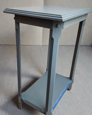 Plain grey painted accent table before Provence Patina Finish transformation by Amy Howard At Home