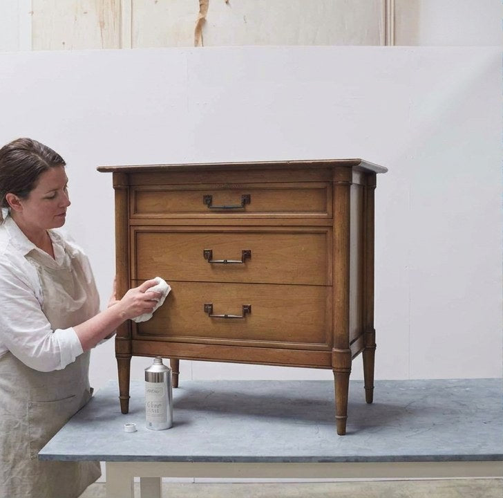 Before: wood nightstand being cleaned in the studio