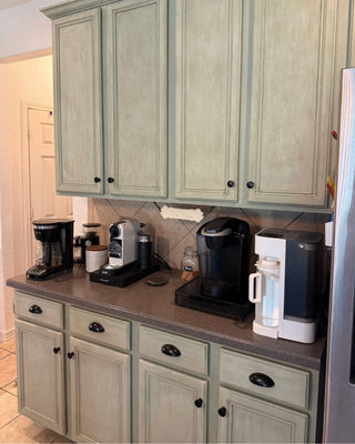 Kitchen cabinets painted with layered Topiary, Calais Green, and Scandinavian Grey Milk Paint over Cracked Gesso